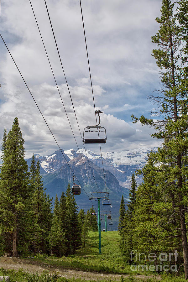 Empty Gondola With View On Lake Louise Photograph