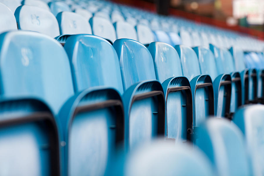 Empty seats in football stadium #1 Photograph by Image Source