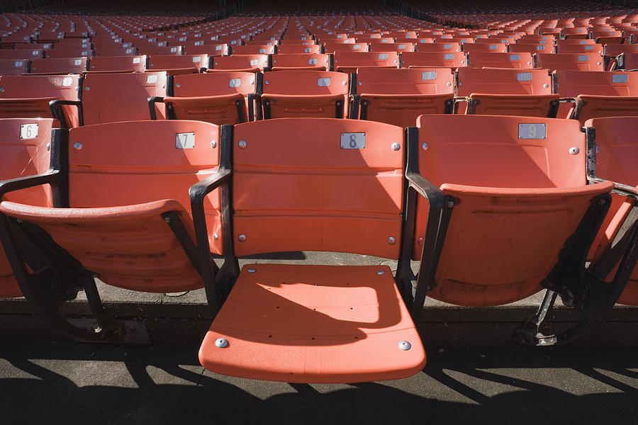 Empty stadium seats, one seat down #1 Photograph by David Madison