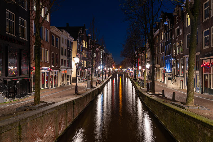 Empty streets and shops in the Red Light District in Amsterdam #1 Photograph by George Pachantouris