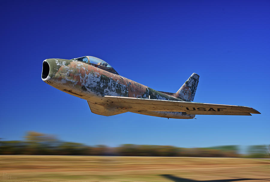 F-86 Sabre from 1950s flies free again at the Walhalla ND airport Photograph by Peter Herman