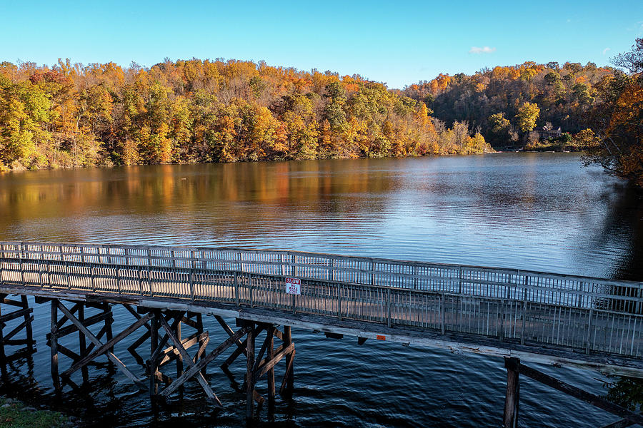 Fall colors surround the lake and trail at Cheat Lake Park Photograph ...