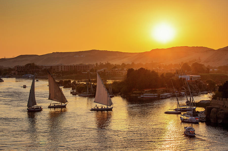 felucca boats on Nile river  at sunset #1 Photograph by Mikhail Kokhanchikov