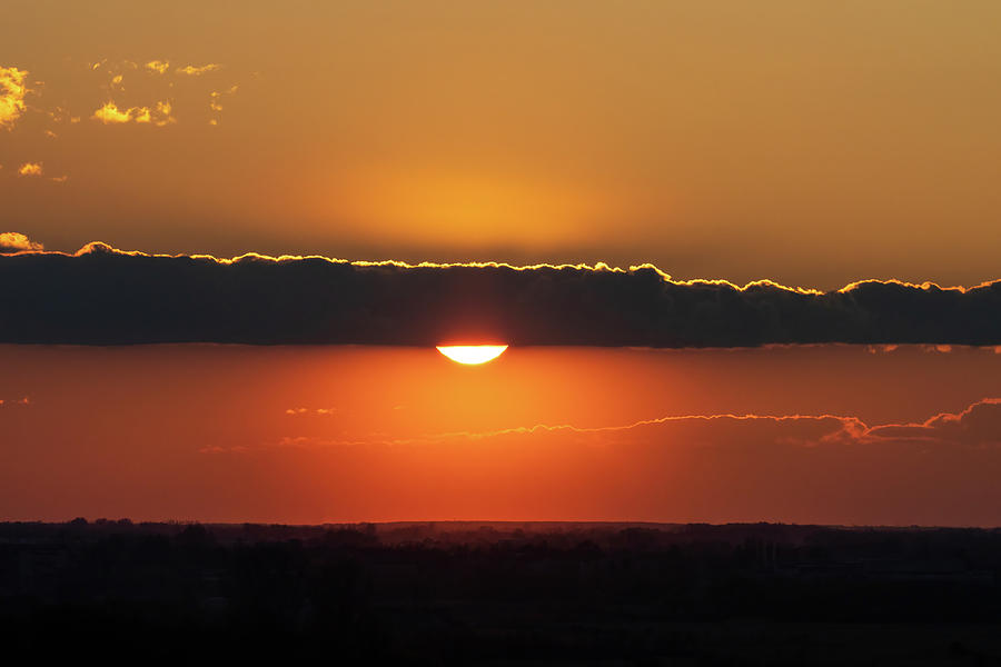 Fiery sunset with the sun behind a cloud Photograph by Wladyslaw ...