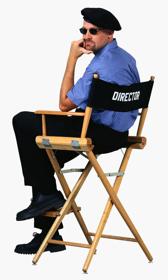 Film Director Sitting in his Directors Chair #1 Photograph by Glyn Jones/Corbis/VCG