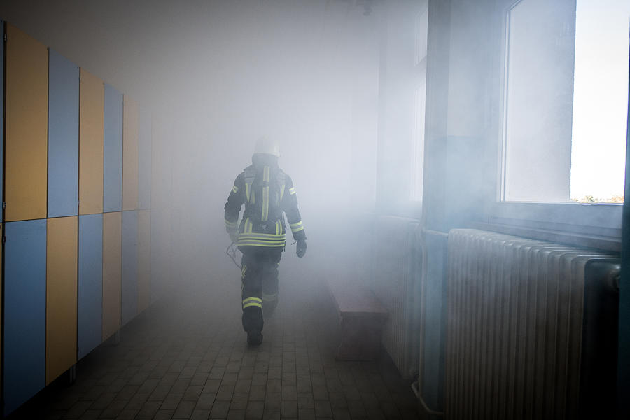 Firefighter in fire-rescue operation #1 Photograph by AlenaPaulus