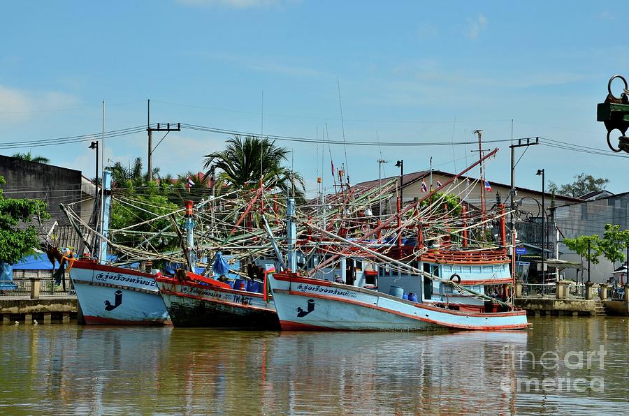 Fishing boats docked at fish harbor Pattani Thailand #4 Photograph by Imran Ahmed