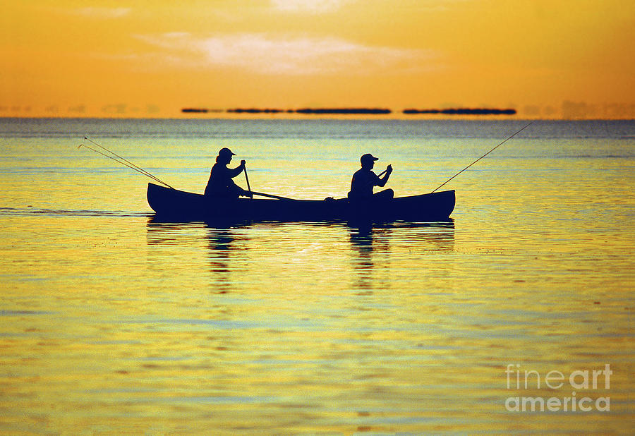 Fishermen Paddeling a Canoe in Florida Bay, Everglades National Park Photograph by Wernher Krutein