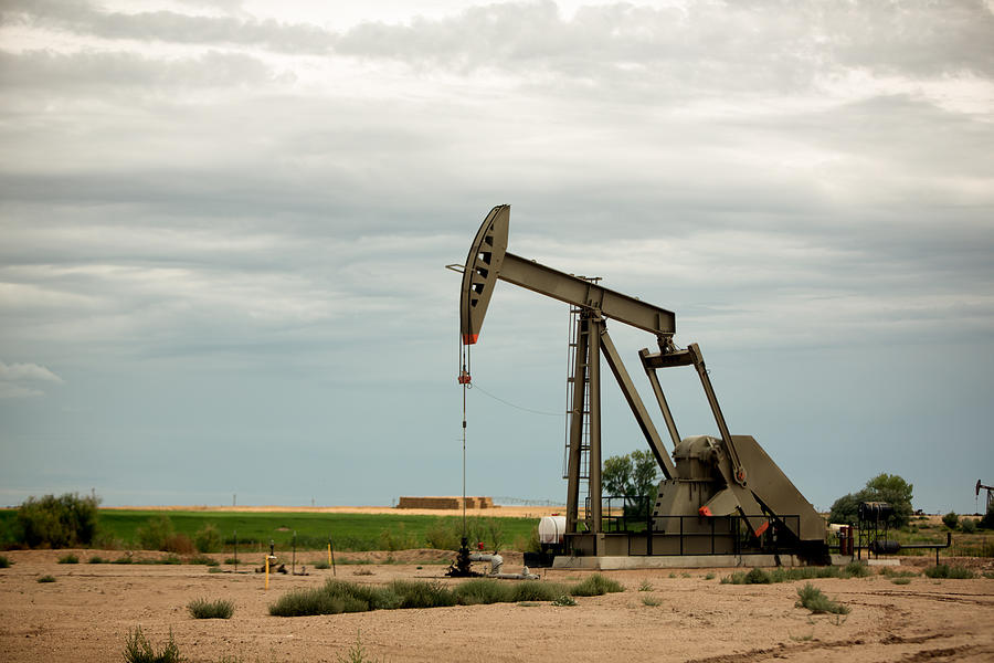 Fracking Pumpjacks in the Oil Field #1 Photograph by Grandriver