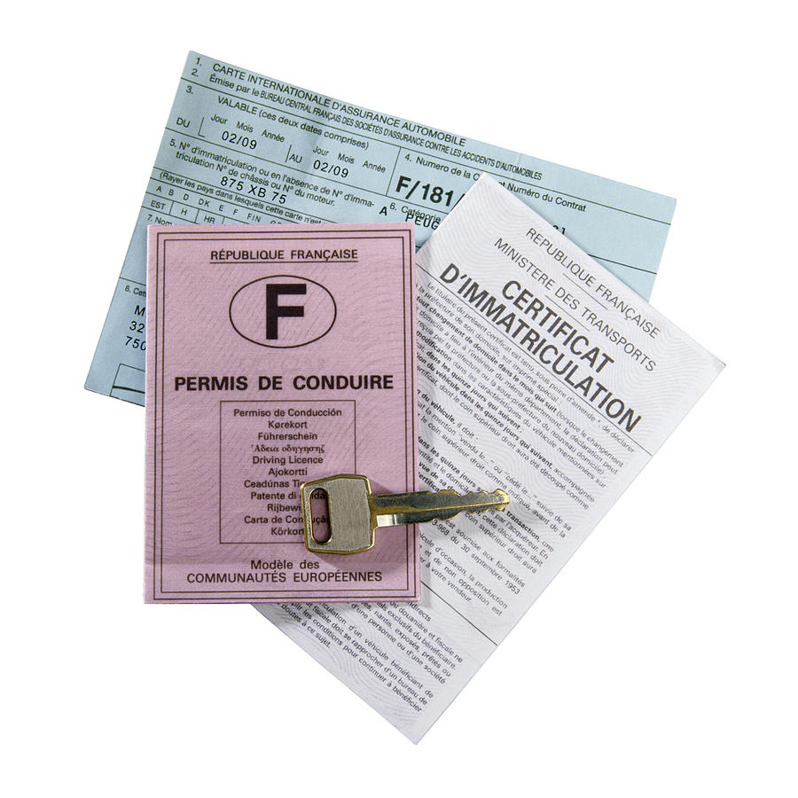French Driving License and Insurance Papers #1 Photograph by Ryan McVay
