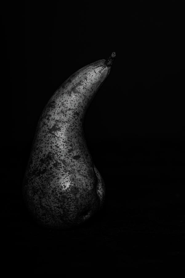 Fresh And Healthy Pear Fruit On A Black Background Photograph