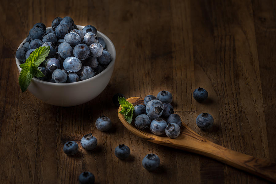 Fresh Blueberry On A Wooden Table And Bowl #1 Photograph by Stefanocar75