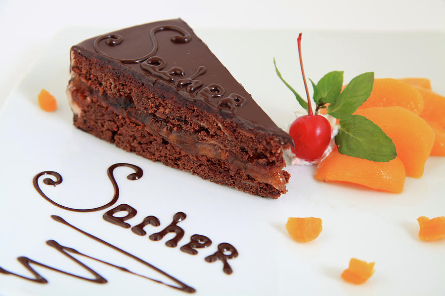 Fresh Chocolate Sacher Cake With Decoration Photograph