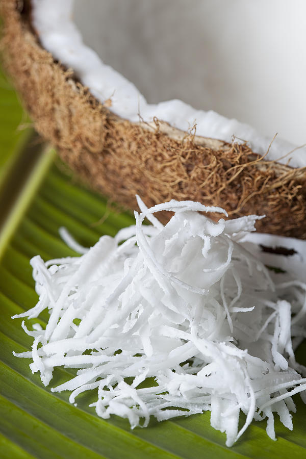 Fresh grated coconut. #1 Photograph by Enviromantic