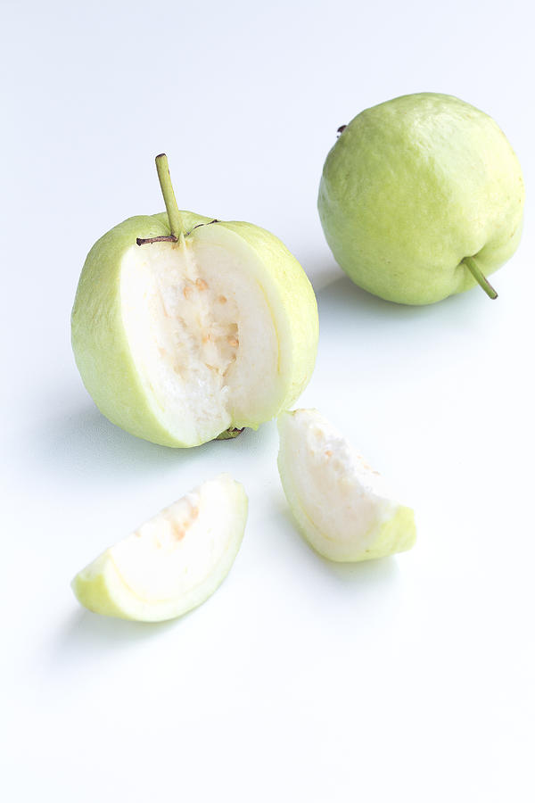 Fresh guava on white background #1 Photograph by Akkalak