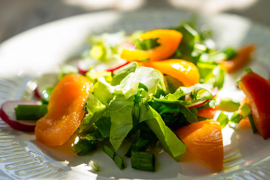Fresh salad with summer vegetables on the wooden table #1 Photograph by Mindstyle