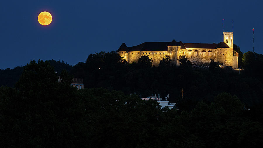 Full moon beside Ljubljana Castle #1 Photograph by Ian Middleton