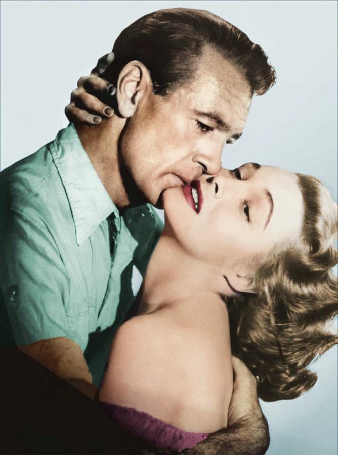 Gary Cooper Photograph - Gary Cooper and Patricia Neal #1 by Movie World Posters