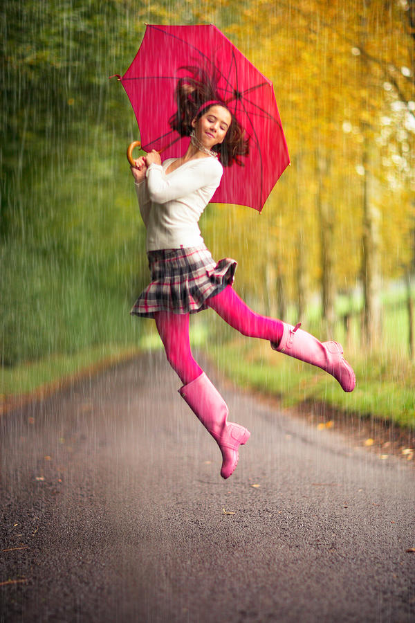 Girl Dancing in the Rain #1 Photograph by Sasha Bell