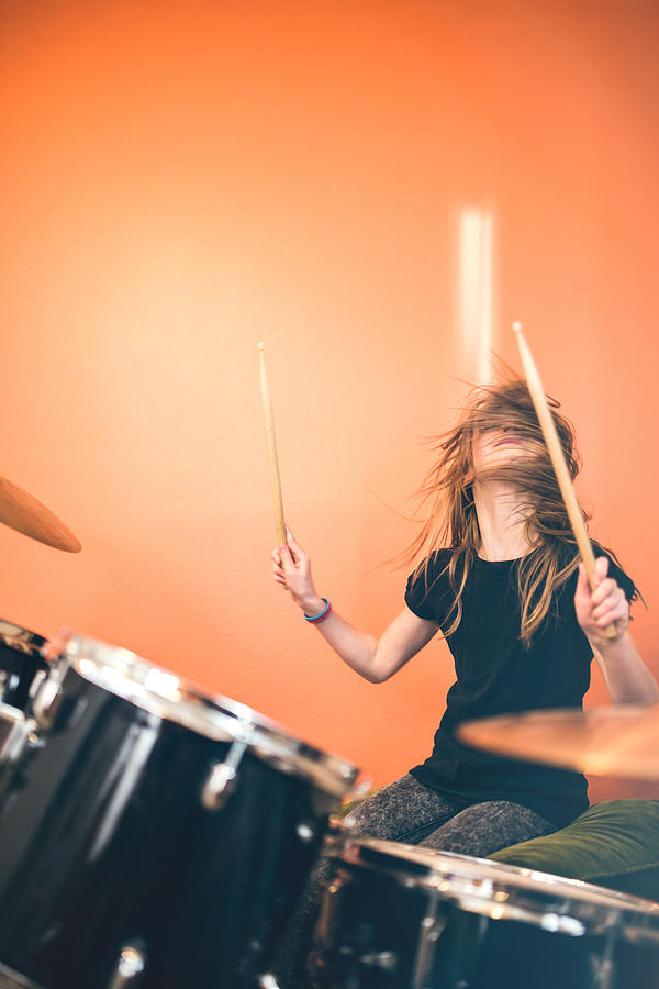 Girl Playing Rock and Roll Drums #1 Photograph by RyanJLane