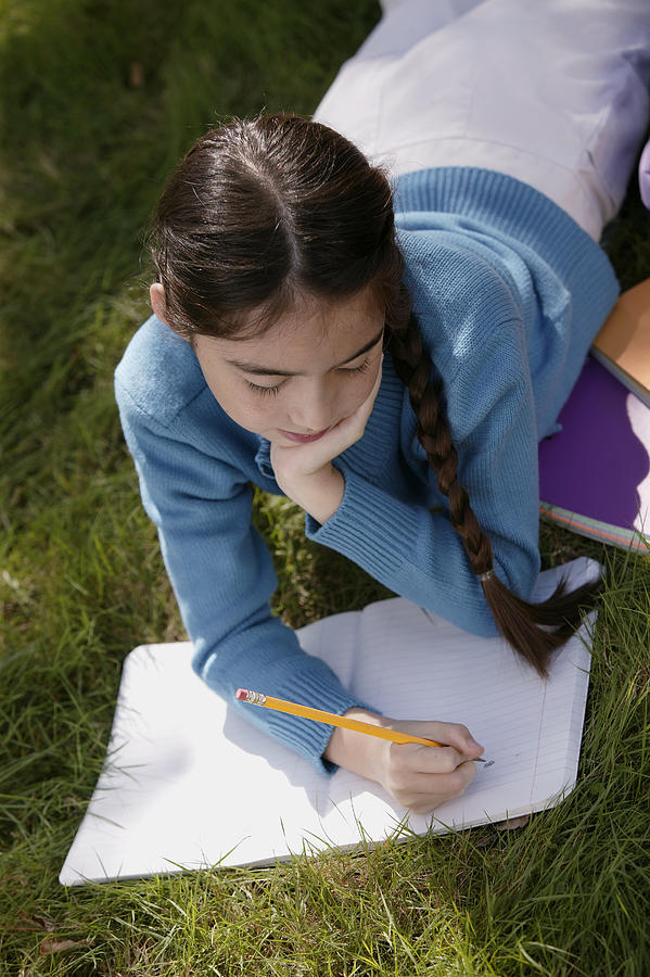 Girl studying outdoor #1 Photograph by Comstock Images