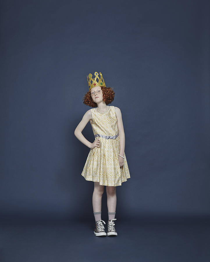 Girl wearing a gold crown #1 Photograph by Flashpop