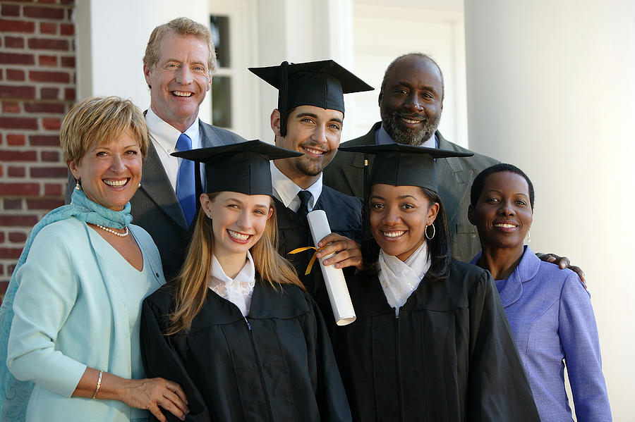 Graduates and parents #1 Photograph by Comstock Images