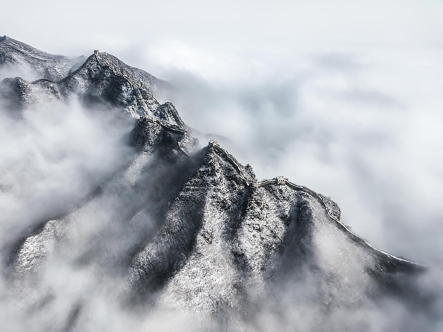 Great Wall of China in winter with fog, Beijing, China #1 Photograph by Xuanyu Han