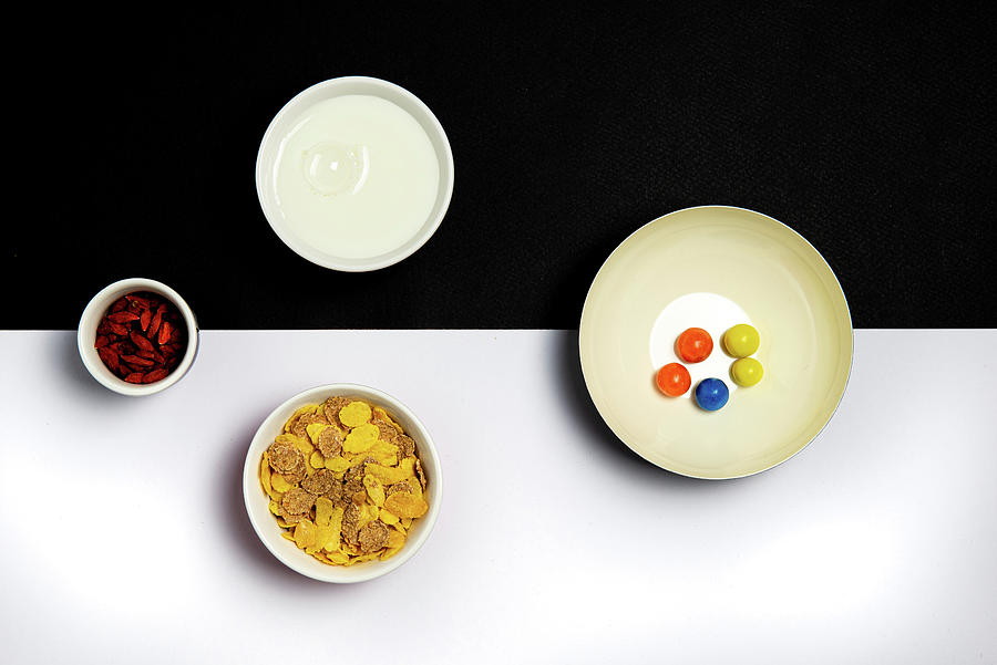 Group ceramic bowls with healthy cereal breakfast. Still-life Photograph by Michalakis Ppalis