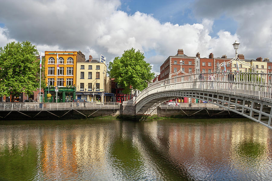 Ha Penny Bridge on River Liffey in Dublin #1 Photograph by Artur Bogacki