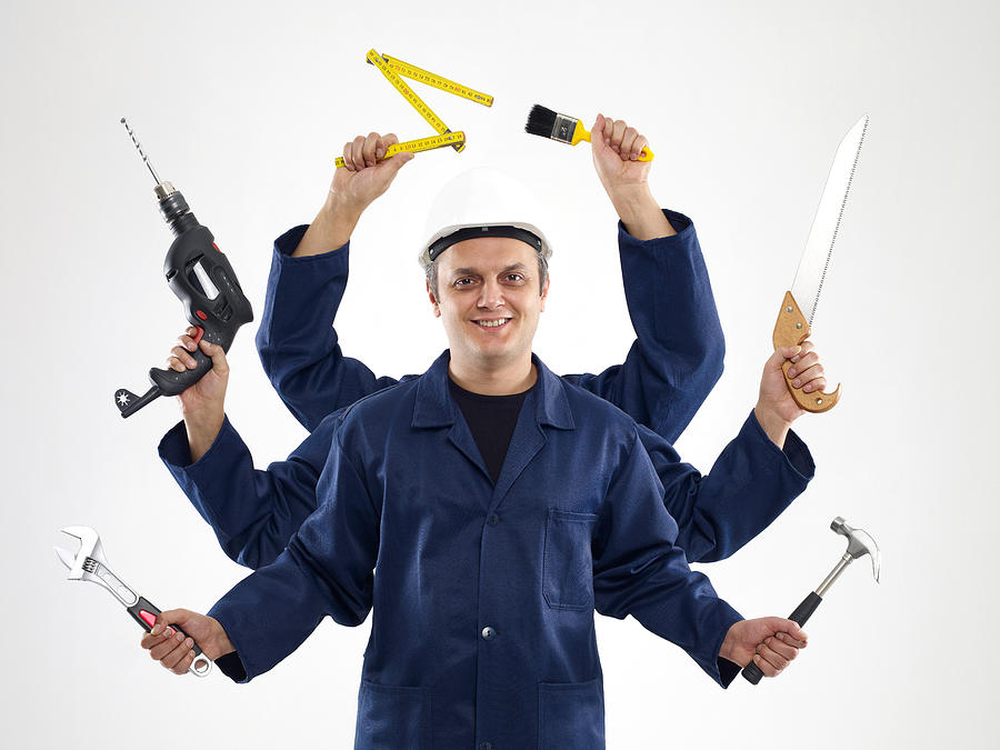 Handyman With Six Arms (Digital Composite) #1 Photograph by Kemalbas