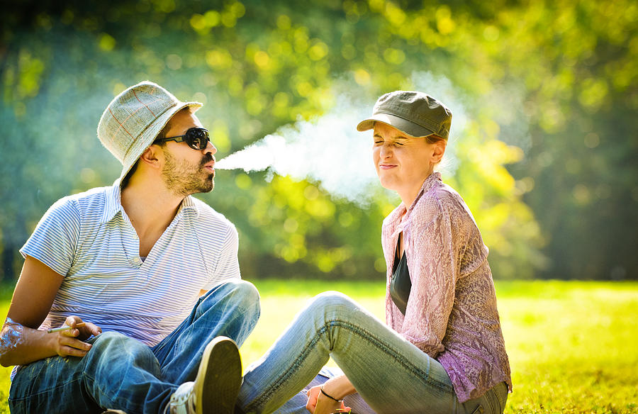 Happy Beautiful couple having fun in the park #1 Photograph by Anouchka