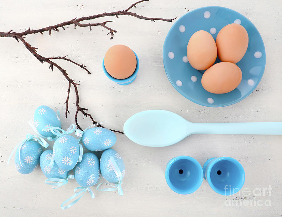 Happy Easter blue and white theme eggs on white wood table background.  #1 Photograph by Milleflore Images