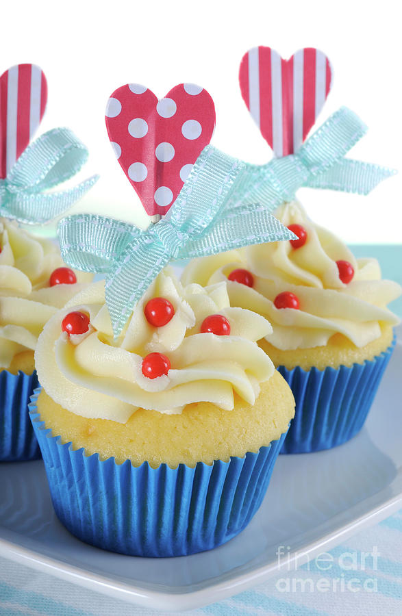 Happy Fathers Day bright and cheery red white and blue decorated cupcakes #1 Photograph by Milleflore Images