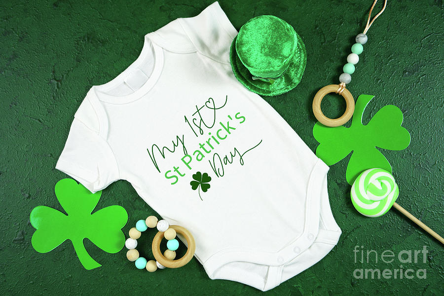 Happy St Patricks Day baby wear onesie bodysuit mockup flatlay. #1 Photograph by Milleflore Images