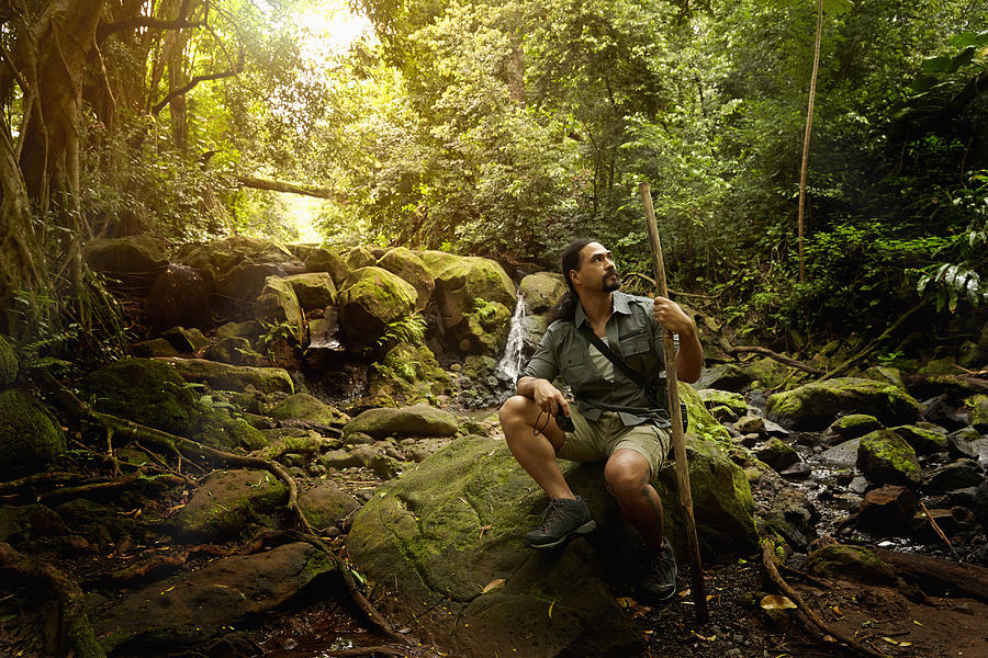 Hawaiian scientist doing field research in forest #1 Photograph by Colin Anderson Productions pty ltd