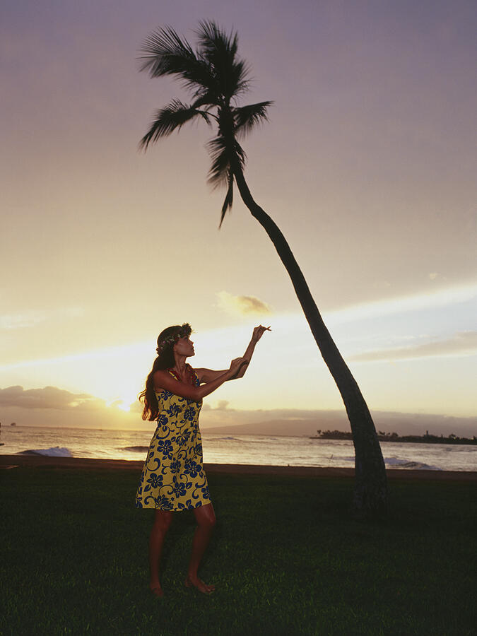 Hawaiian woman dancing at sunset #1 Photograph by Dex Image