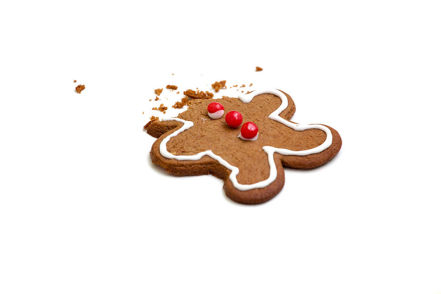 Headless gingerbread man isolated on white background Photograph by Timnewman