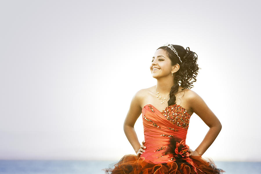 Hispanic teenager dressed for quinceanera #1 Photograph by Sollina Images