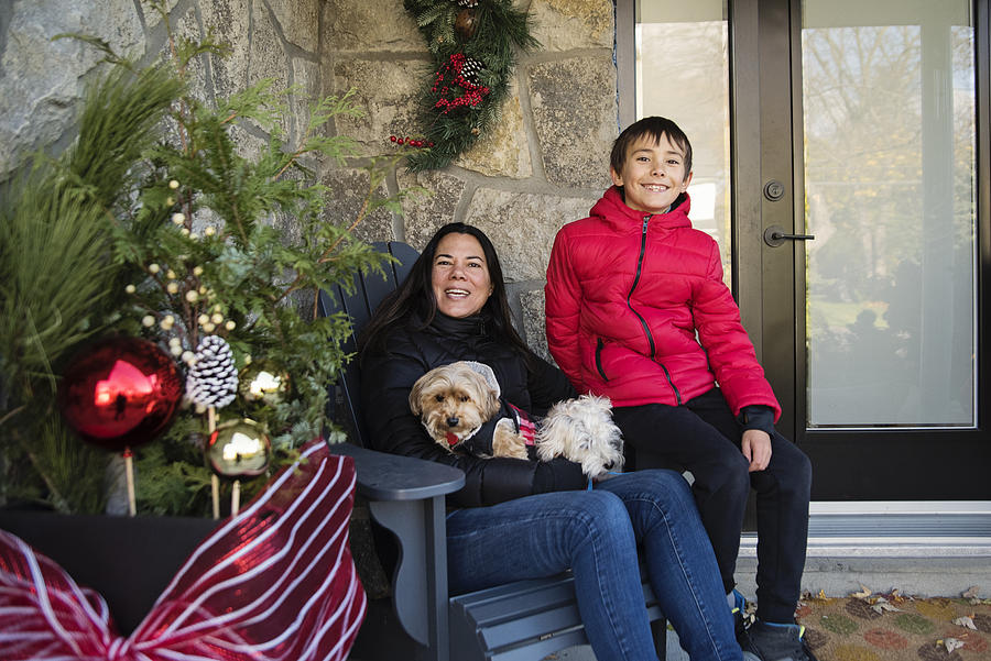 Holiday season portrait of mother, son and dogs outdoors. #1 Photograph by Martinedoucet