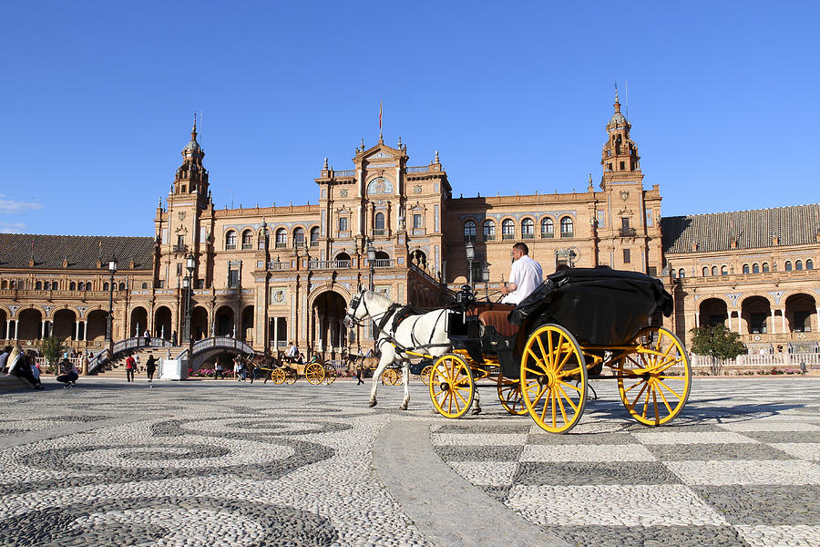 Horse-drawn carriage at Plaza de Espana, Seville #1 Photograph by Thomas Janisch