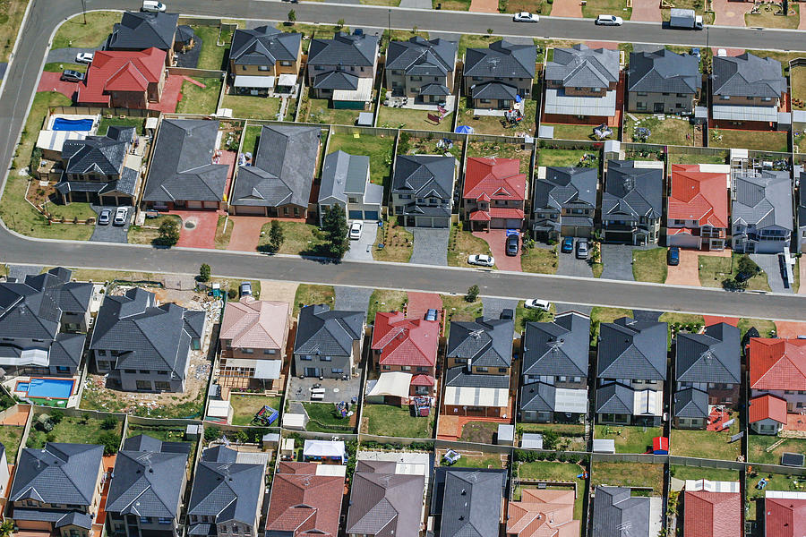 Houses, streets, suburb on edge of city, urban sprawl in Sydney, Australia, aerial photography #1 Photograph by Andrew Merry