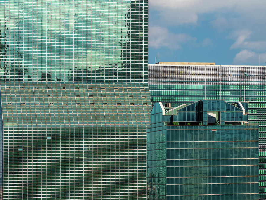 Hundreds of office windows in New York skyscraper #1 Photograph by Steven Heap