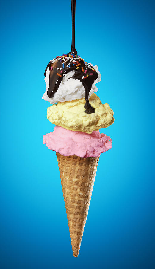 Ice cream cone with chocolate sauce and sprinkles #1 Photograph by Yamada Taro