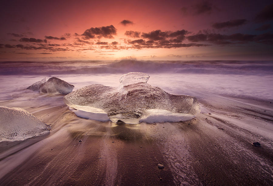 Icebergs on a beach at sunrise. #1 Photograph by Alex Saberi