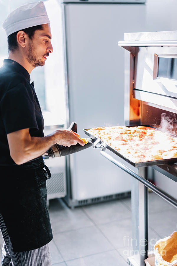 Italian Chef Pizzaiolo Putting Pizza To Oven In Restaurant Kitchen Photograph By Michal Bednarek 3977