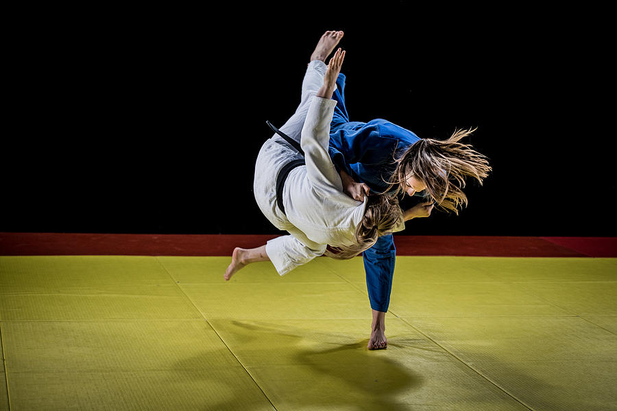 Judo players competing in judo match #1 Photograph by Simonkr