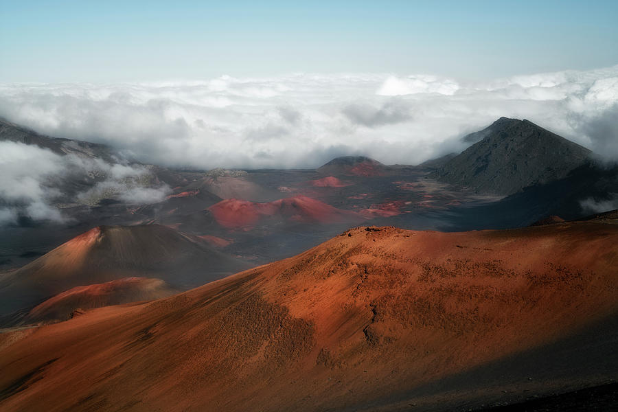 Late afternoon clouds and fog often form over the colorful cinder cones ...