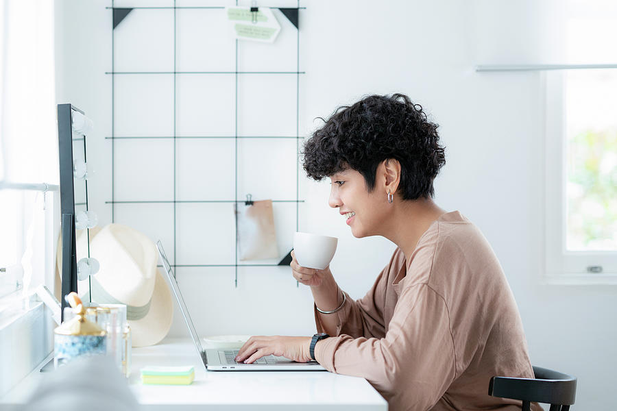 Latin business woman team meeting with video conference Photograph by ...