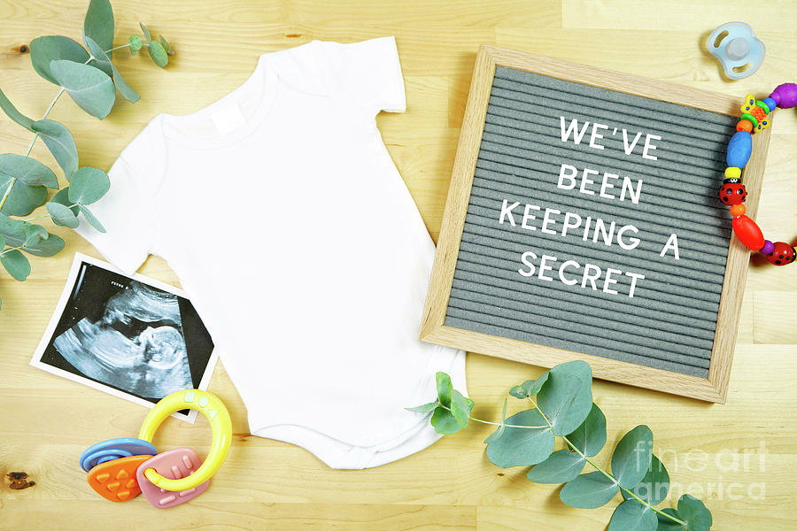 Light natural theme baby apparel top view flat lay. Mock up #1 Photograph by Milleflore Images